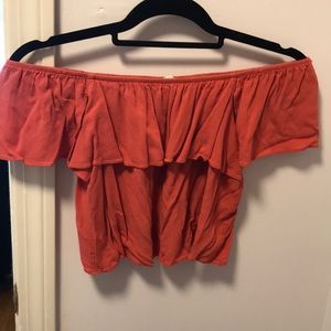 Flouncy burnt orange off the shoulder crop!